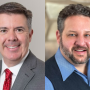Two portrait-style headshots of two men are side by side. At left, the man is wearing a gray suit, with a white shirt and red tie. The man on the right is wearing a light blue collared shirt with a navy blue vest over it.