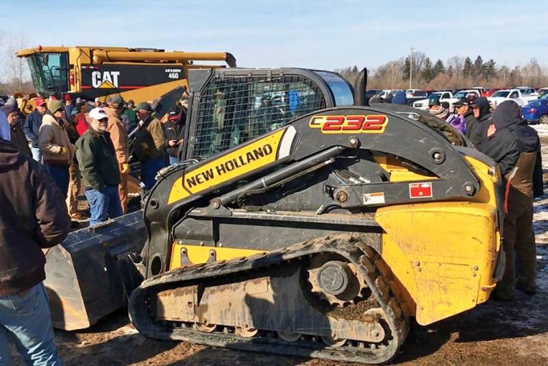 Claiming the second-highest auction price ever, this 2012 New Holland C232 with 827 hours sold for $37,000 at a Jan. 20, 2018, farm auction in Ohio.