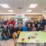 Employees of NatureFresh Farms volunteer at Southwestern Ontario Gleaners, a charitable organization in Leamington, Ontario.