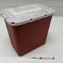 A sharps container safely stores medical waster.
