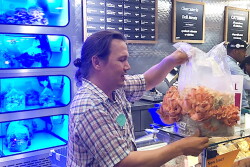 guy with oyster mushrooms