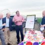 Agriculture Secretary Sonny Perdue (from left) with  Rep. Jimmy Panetta, D-Calif., Rep. Doug LaMalfa, R-Calif,, visit with Soren Bjorn,  president of Driscoll's of the Americas and Tom OBrien, (hidden), senior vice president and general counsel for Driscoll's, at one of the company's  farms in Royal Oaks, Calif..
