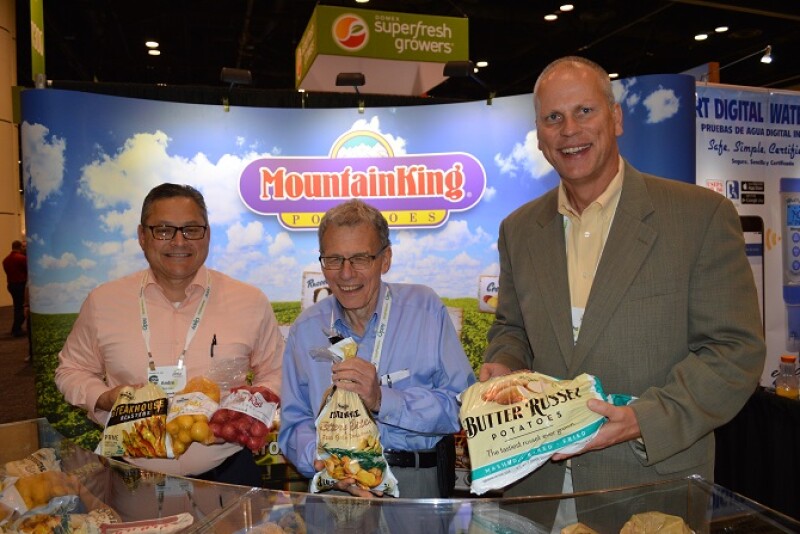  Andre Rohrman, sales representative for Mountain King Potatoes, with Cary Hoffman, president of Mountain King and John Pope, vice president of sales and marketing, with the Houston based company. 