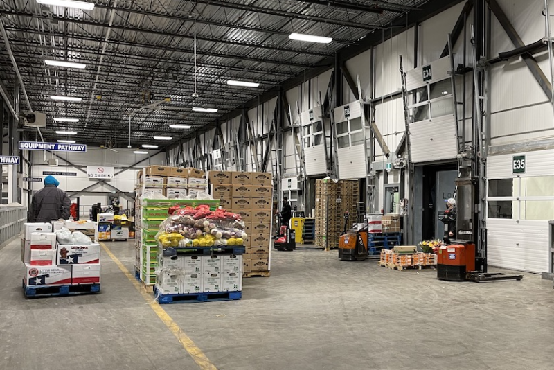 Inside Ontario Food Terminal, masked guy